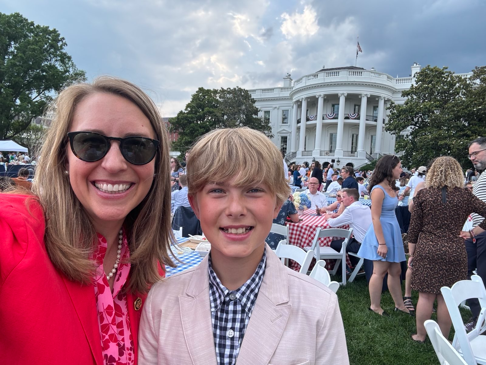 Congresswoman and Wesley at White House