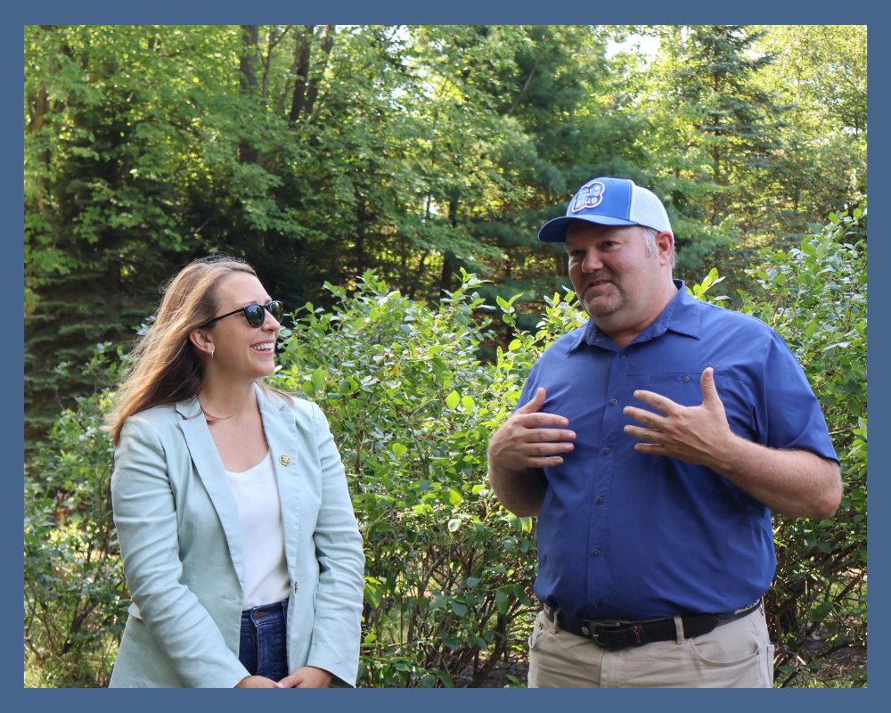 Congresswoman Scholten with Blueberry Farmer