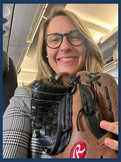 Rep. Scholten poses with Softball Glove